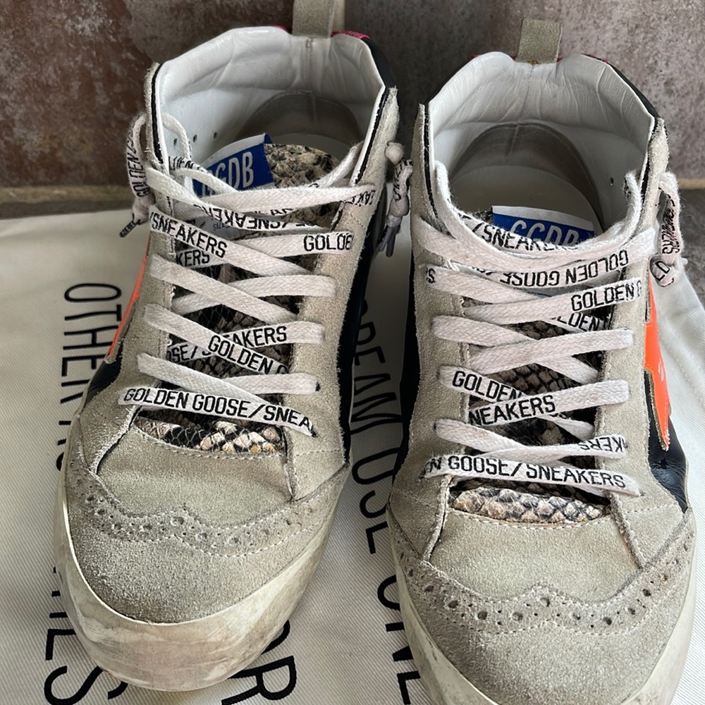 Limited edition of Golden Goose black and orange with yellow bottom size 37